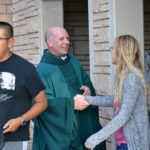 Fr. Rob greeting students